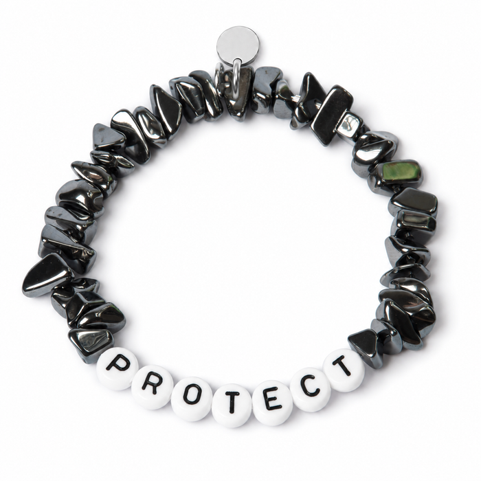 Hematite chipstone bracelet with white beads and black letters spelling PROTECT, shown as an example personalisation, with a blank silver tag