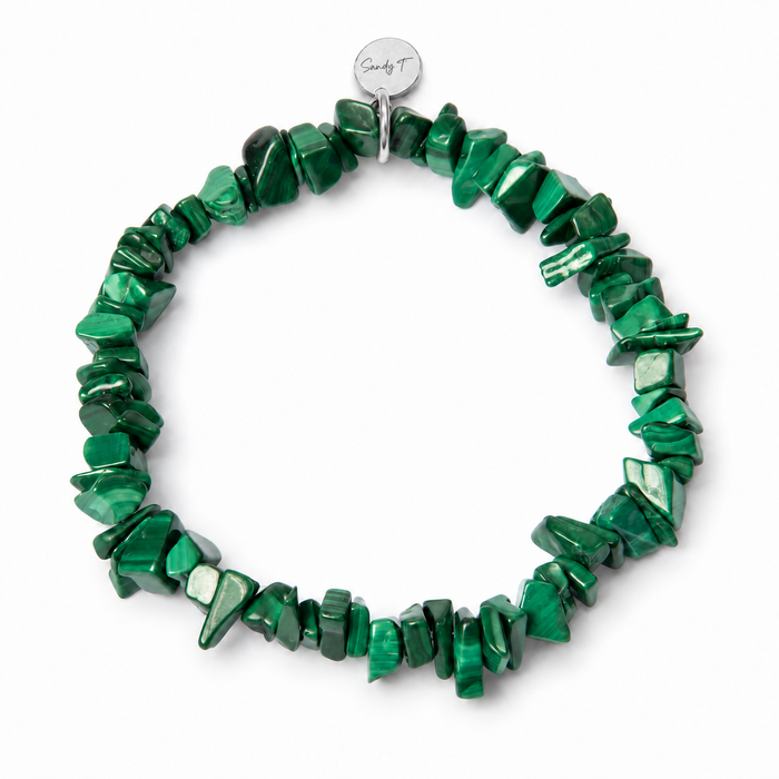 Malachite chipstone bracelet with a round sterling silver Sandy T signature tag on a white background