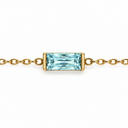 March birthstone-colour bracelet with a pale aqua rectangular faceted stone and polished gold-tone chain on white.