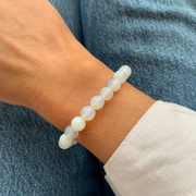 Natural Moonstone round gemstone bracelet on model by Sandy T – balance and intuition