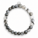 Black Tourmaline 6mm Round Stone Bracelet by Sandy T, shown on a white background, with a blank silver tag