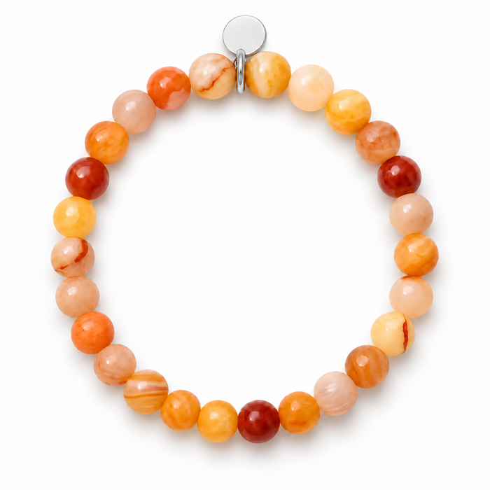 Carnelian 6mm Round Stone Bracelet by Sandy T, shown on a white background, with a blank silver tag