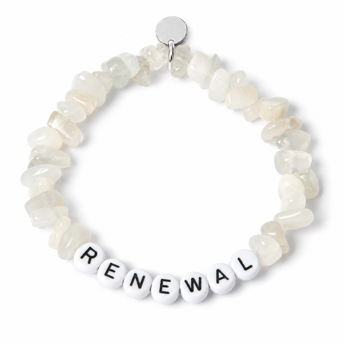 Moonstone chipstone bracelet with white beads and black letters spelling RENEWAL, shown as an example personalisation, with a blank silver tag